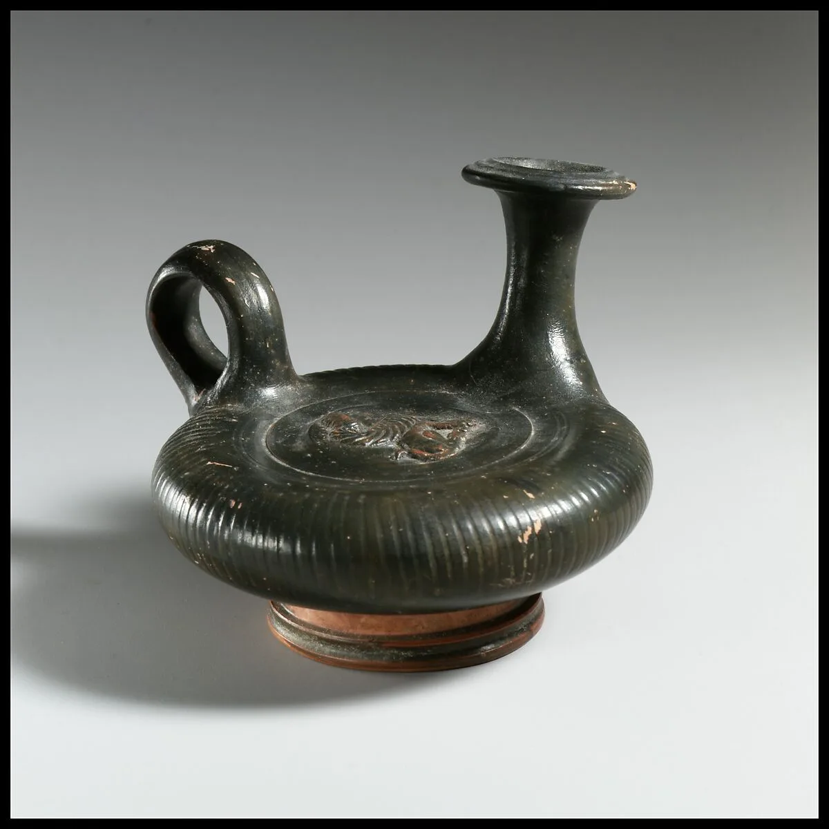 Terracotta guttus (flask with handle and verticle spout) — Unknown