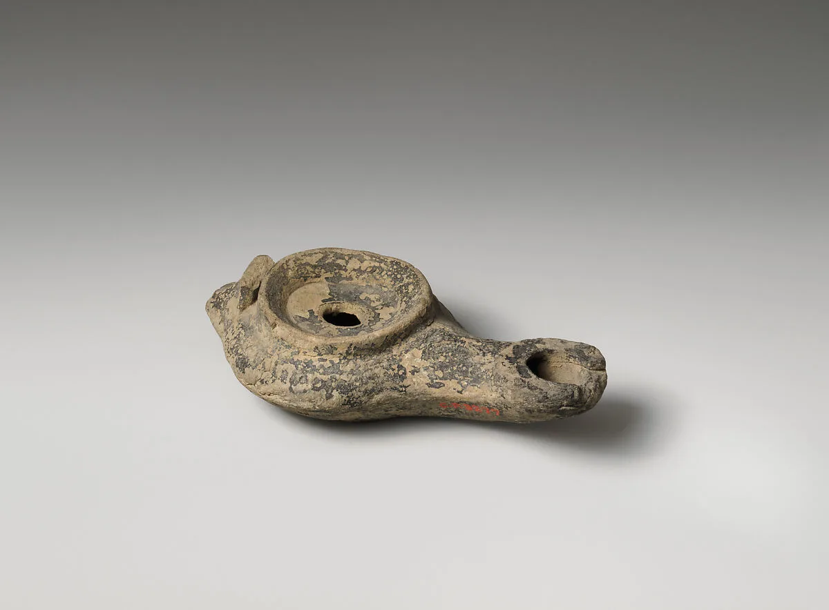 Terracotta oil lamp — Unknown