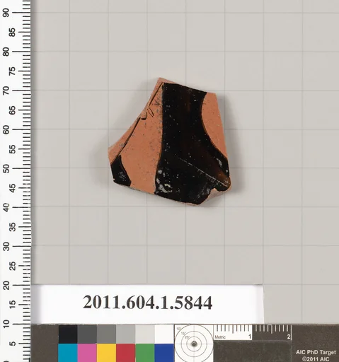 Terracotta fragment of a kylix: eye-cup (drinking cup)