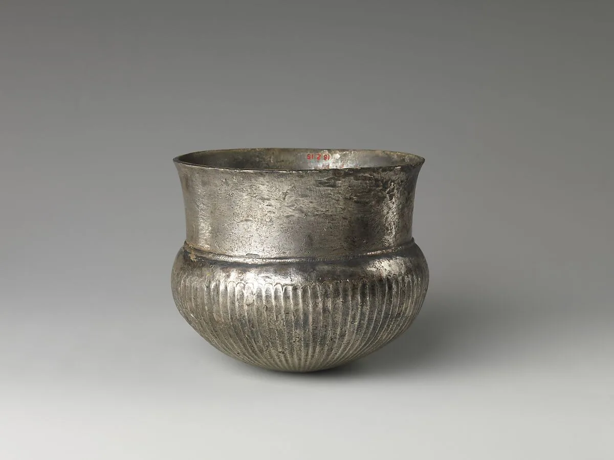 Bowl with flutes f rom shoulder to rosette at base — Unknown