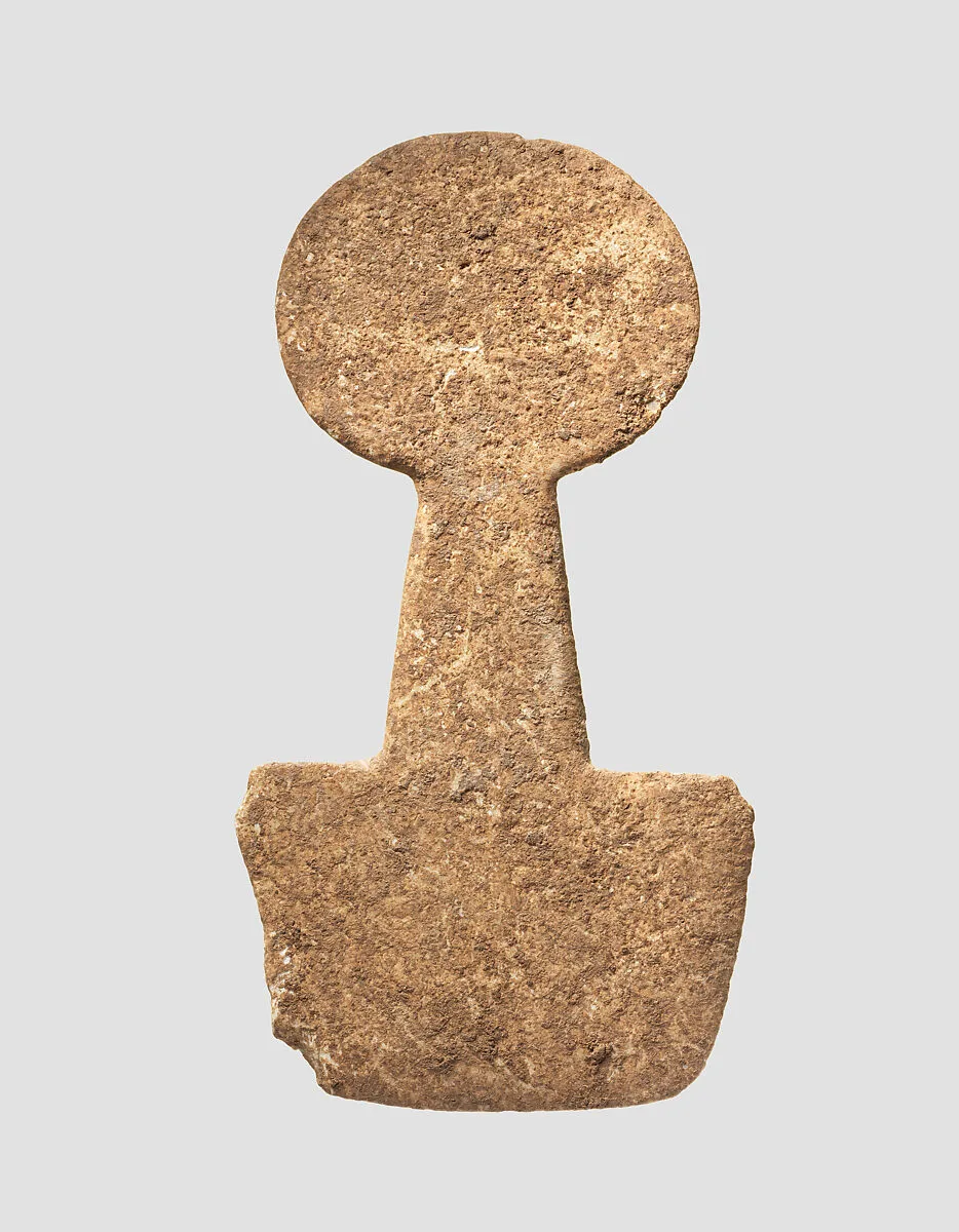 Spade-shaped schematic female (?) figure — Unknown