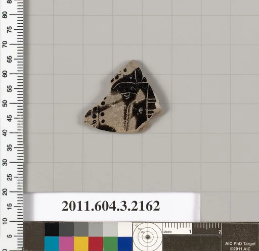 Terracotta fragment of a kylix (drinking cup)