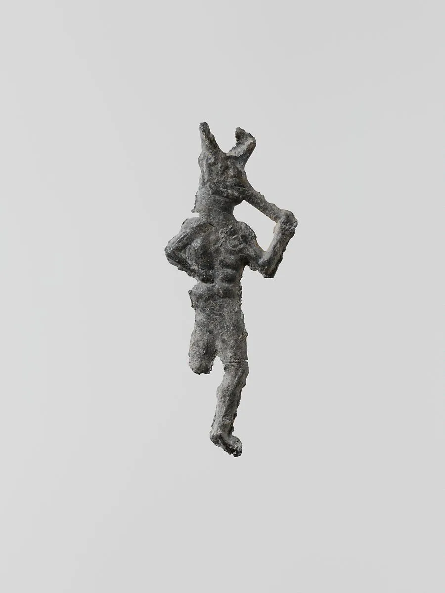 Lead figure of a flute-player — Unknown