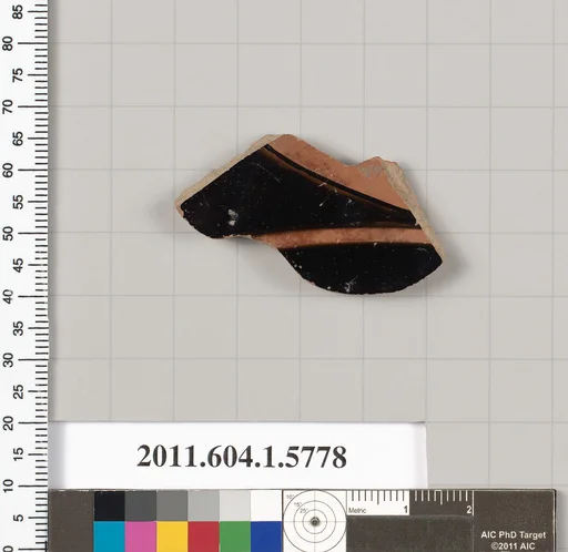 Terracotta fragment of a kylix: eye-cup (drinking cup)
