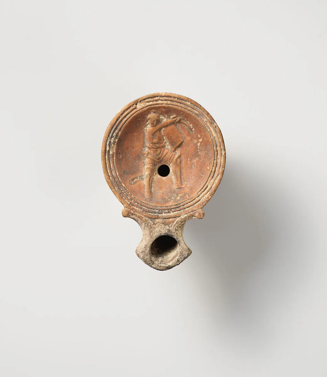 Terracotta oil lamp — Unknown
