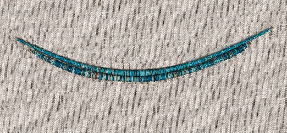 String of blue faience disk beads — Unknown