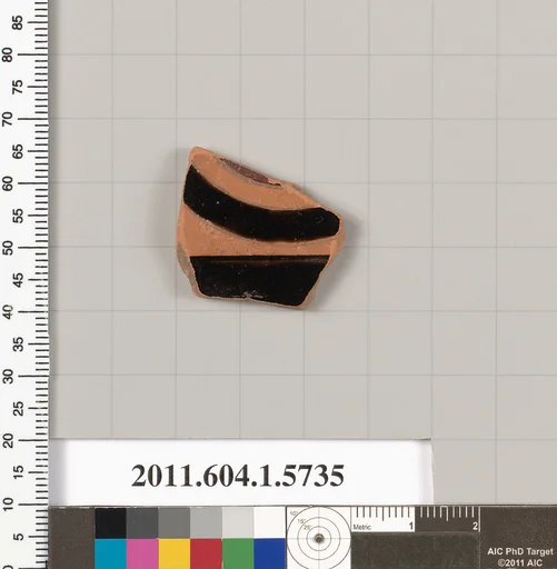 Terracotta fragment of a kylix: eye-cup (drinking cup)