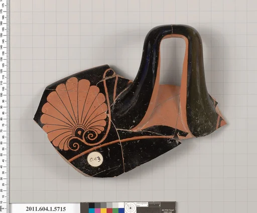 Terracotta fragment of a kylix: eye-cup (drinking cup)