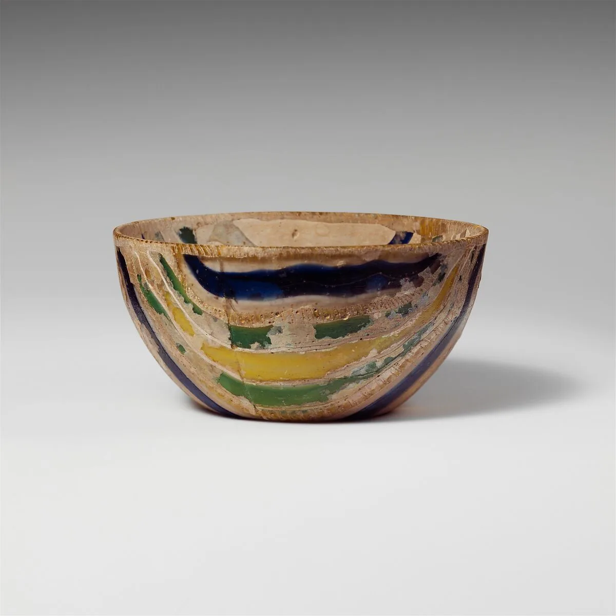 Glass striped mosaic bowl — Unknown