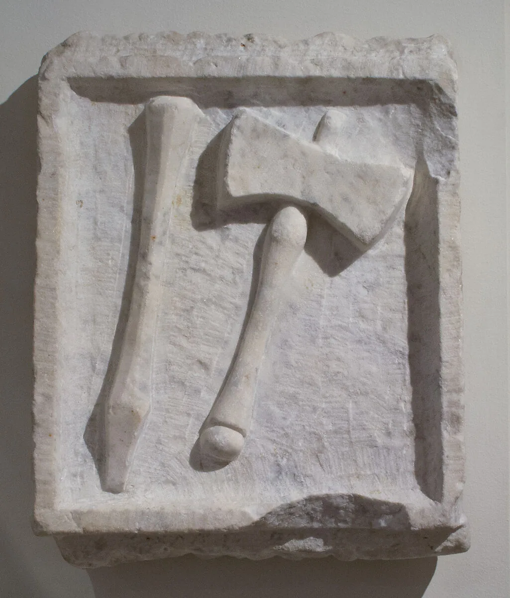 Marble relief of a chisel and mallet — Unknown