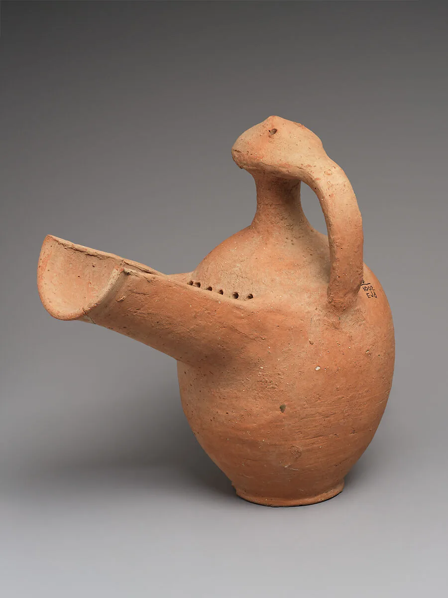 Jug with strainer — Unknown