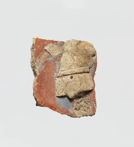 Stucco fragment with male torso