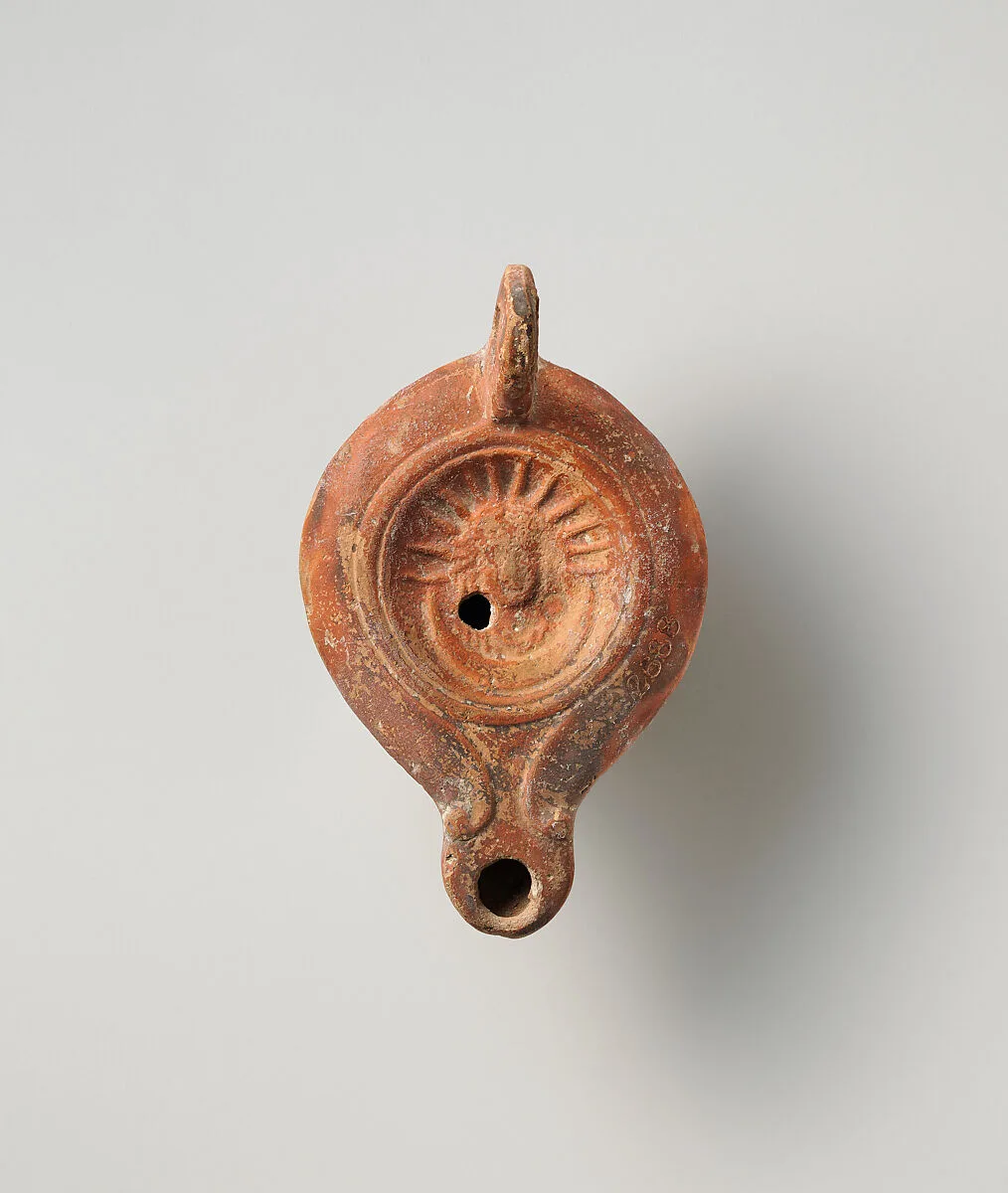 Terracotta oil lamp — Unknown