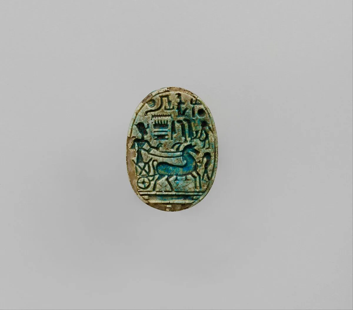 Scarab Inscribed With the Prenomen of Ramesses II and depicting the king in his chariot trampling an enemy — Unknown