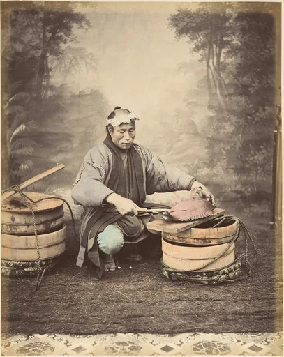 [Japanese Man Preparing a Fish]