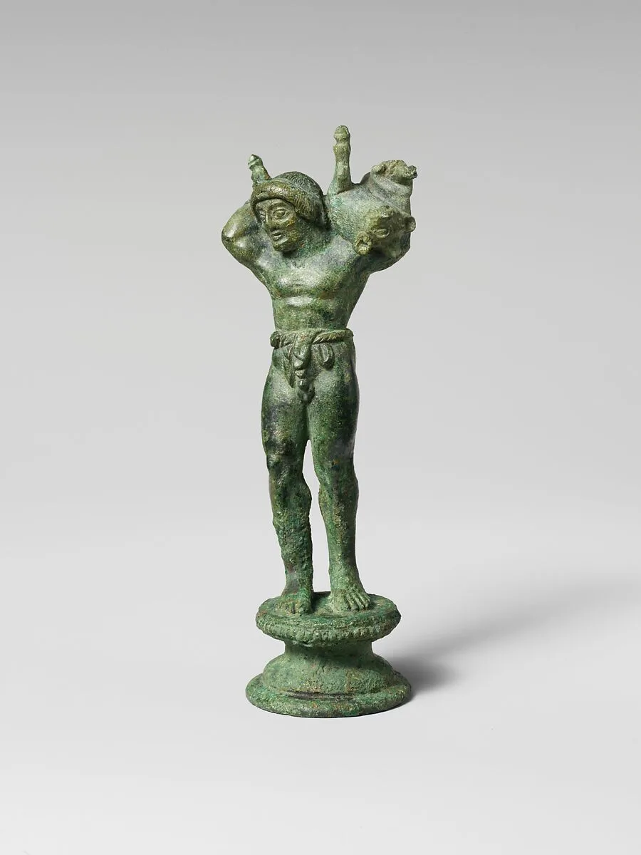 Bronze statuette of a youth carrying a pig — Unknown
