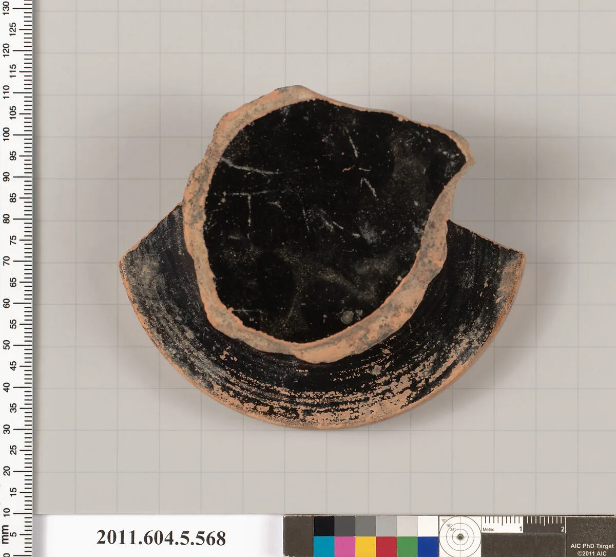 Terracotta fragment of a stemless kylix (drinking cup) — Unknown