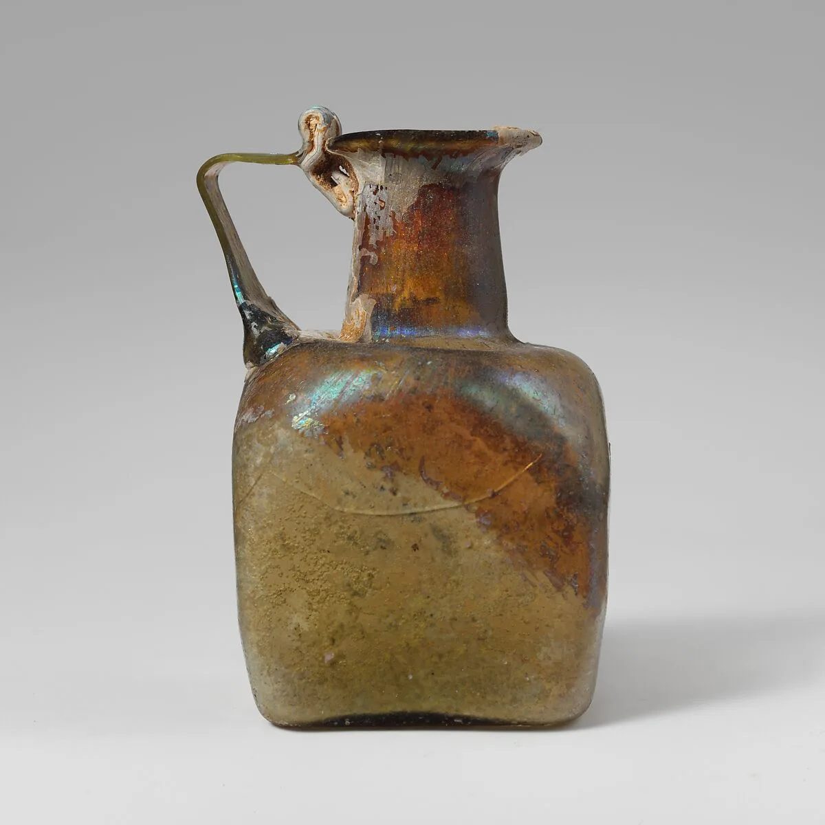 Glass square bottle — Unknown