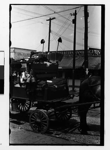 [Two 35mm Film Frames: Detail of Horse-Drawn Houseware Vendor's Cart, New York City]