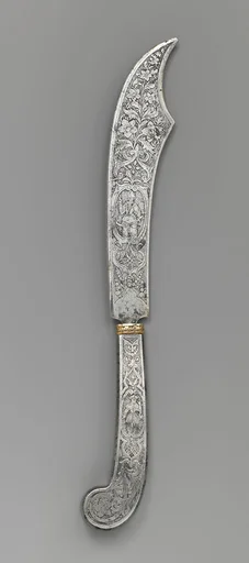 Letter opener with engraved figures