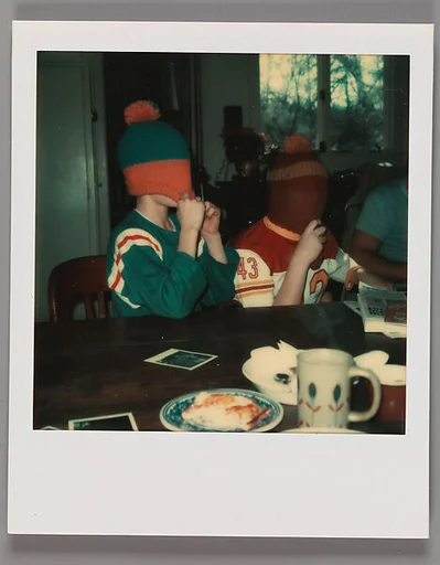 [Boys with Football Knit Caps Pulled Over Heads (Glenn Ives?)]
