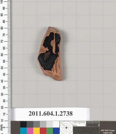 Terracotta fragment of a kylix (drinking cup)