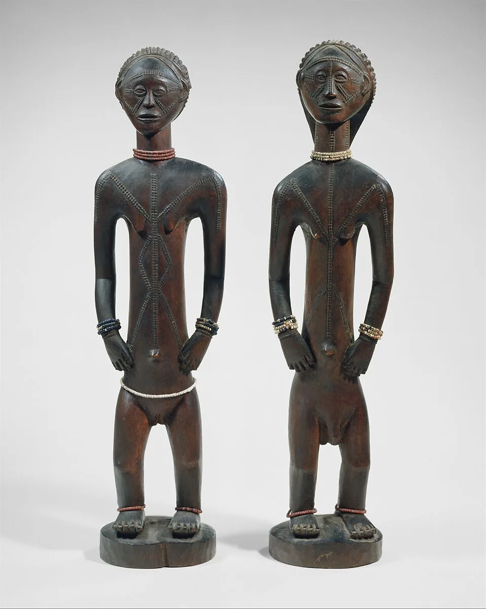 Standing Male and Female Figures — Unknown