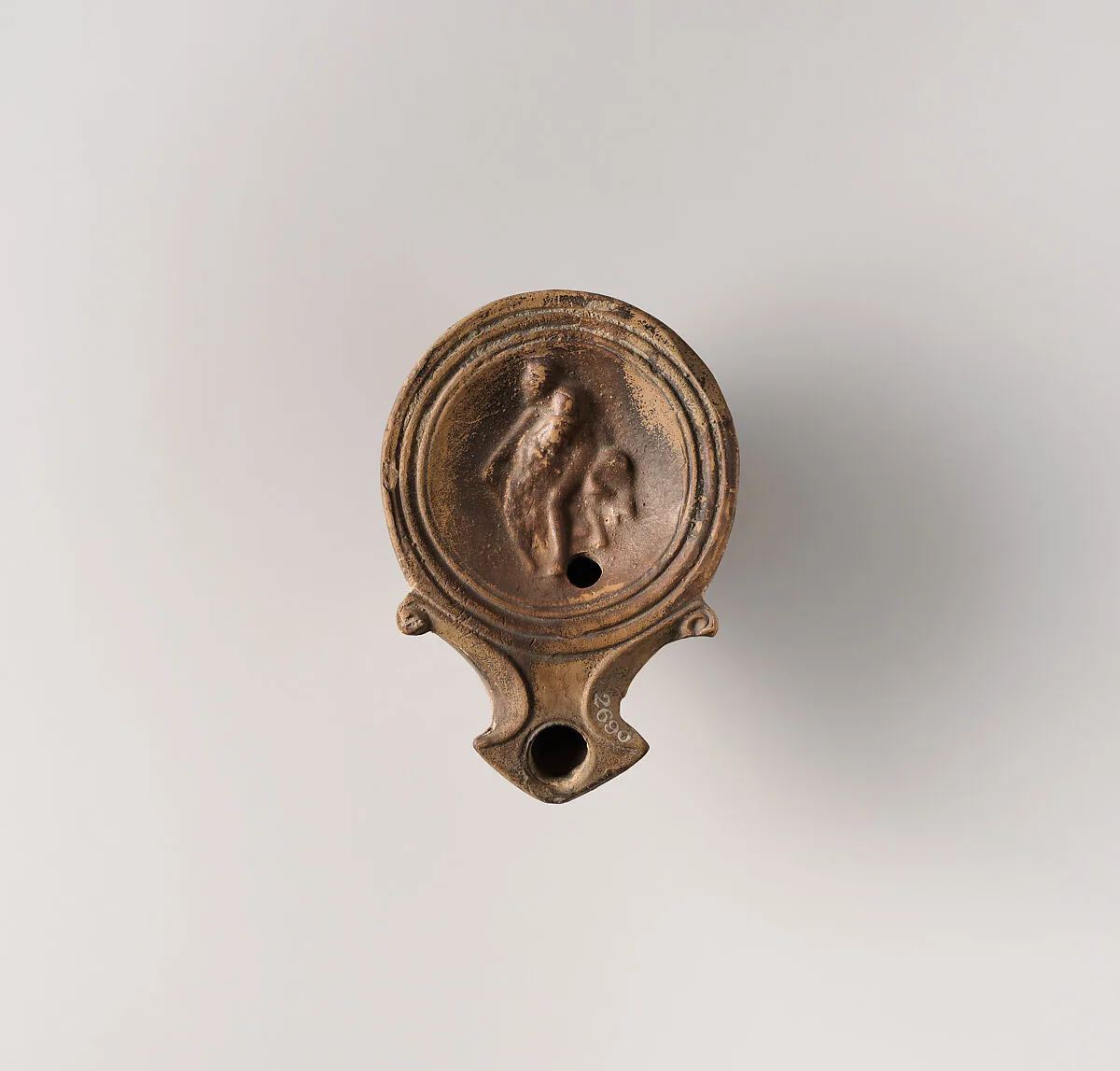 Terracotta oil lamp — Unknown