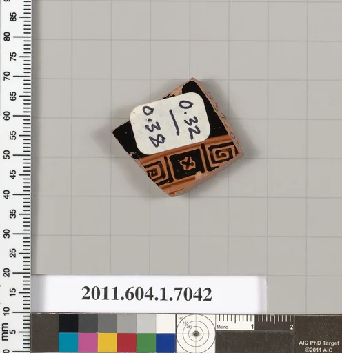 Terracotta fragment of a kylix (drinking cup)