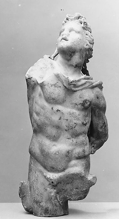 Marble statuette of a male figure with shaggy hair — Unknown