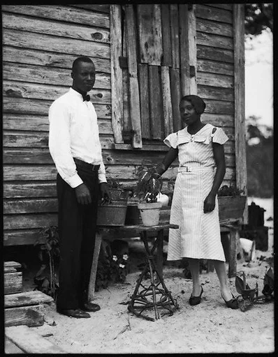[Man in Bow Tie and Woman Outside House, Florida]