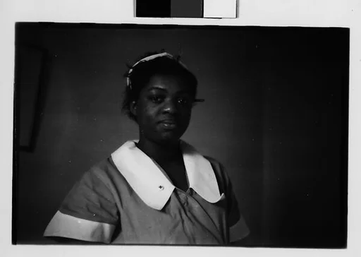 [Five 35mm Film Frames: Red Cross Nurse, Memphis, Tennessee or Forrest City, Arkansas; Street Preacher and Wagon on Sidewalk, Memphis, Tennessee]