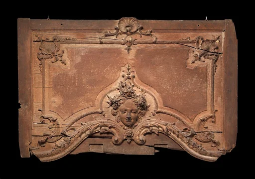 Panel from the top of a mirror frame