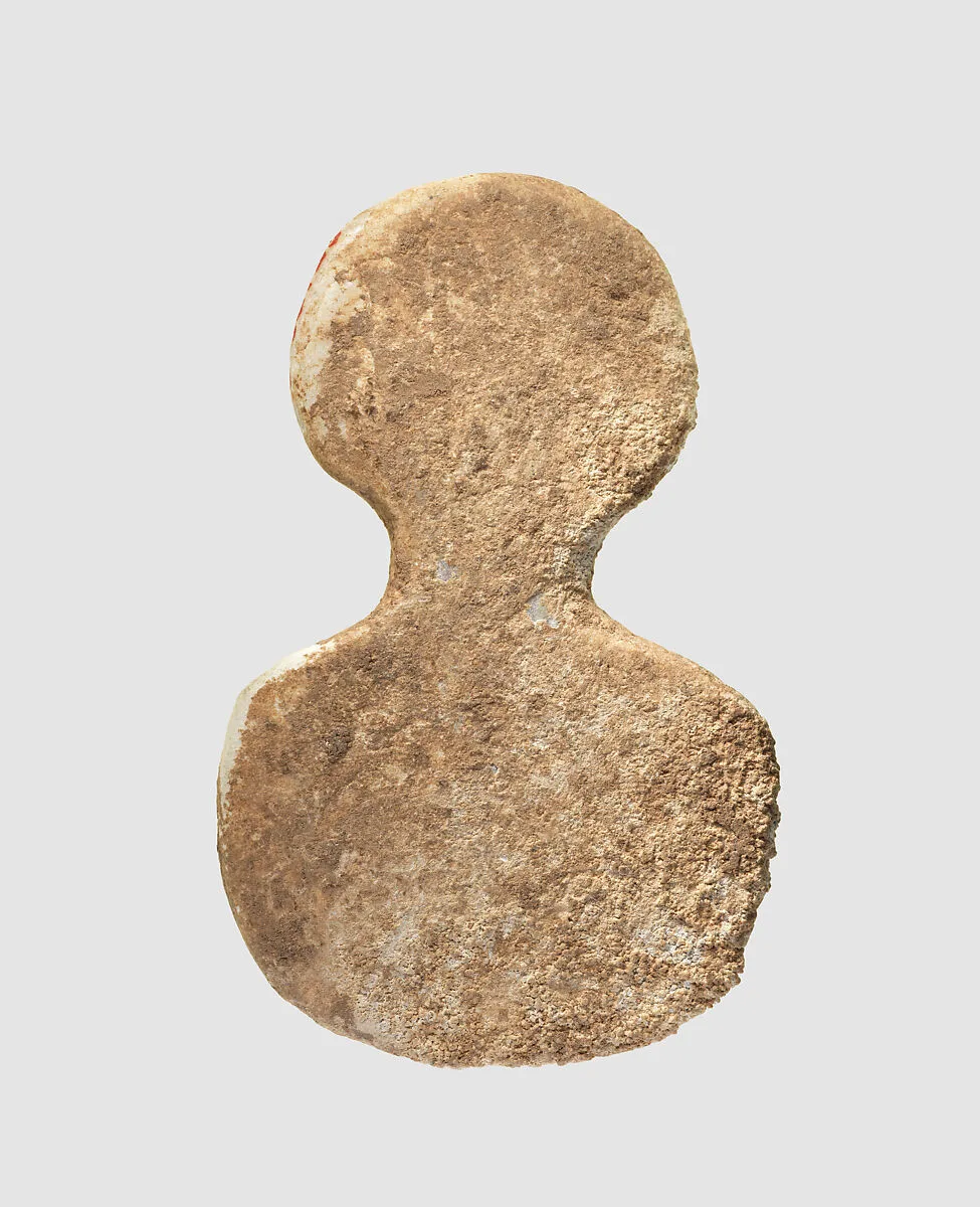 Spade-shaped schematic female (?) figure — Unknown