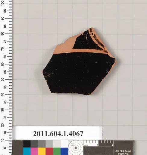 Terracotta fragment of a kylix (drinking cup)