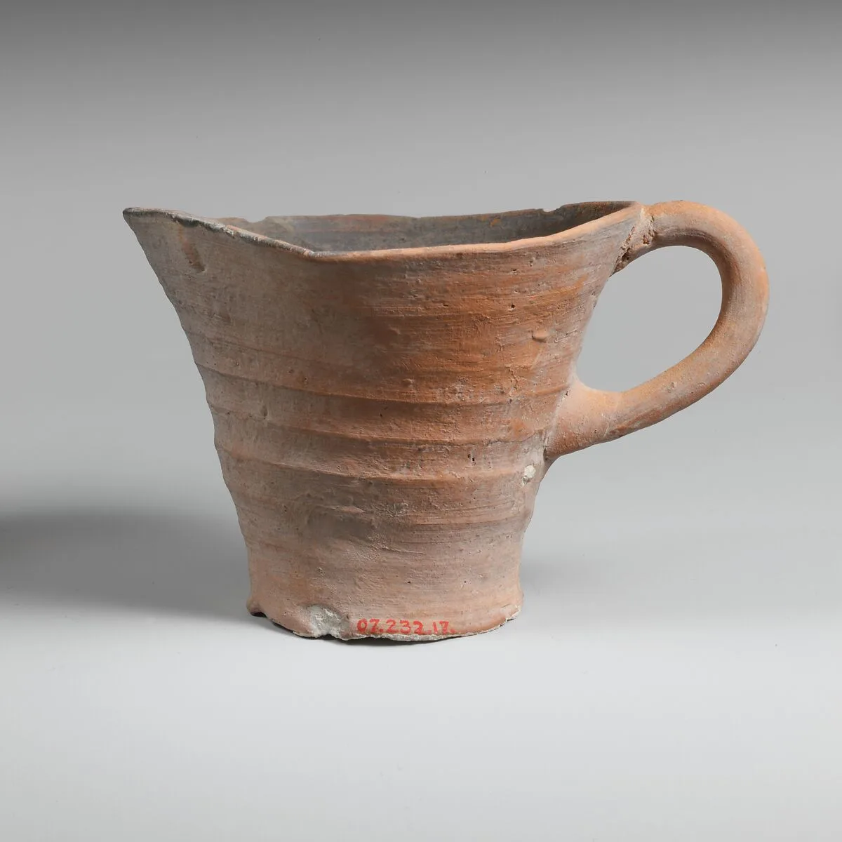 Terracotta one-handled cup — Unknown