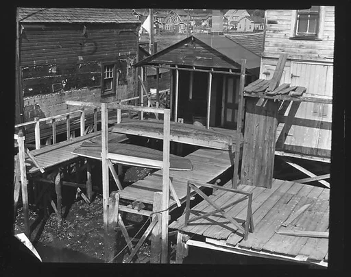 [Docks and Wooden Shack on Waterway, Possibly Canarsie, Brooklyn, New York]