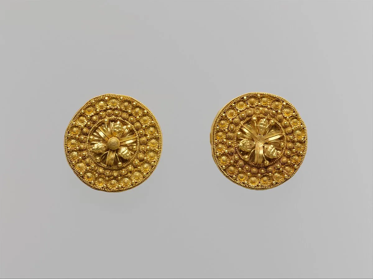 Gold disks with floral motifs and lions' heads — Unknown