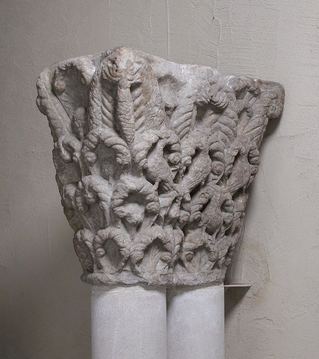 Double Capital with Birds — Unknown