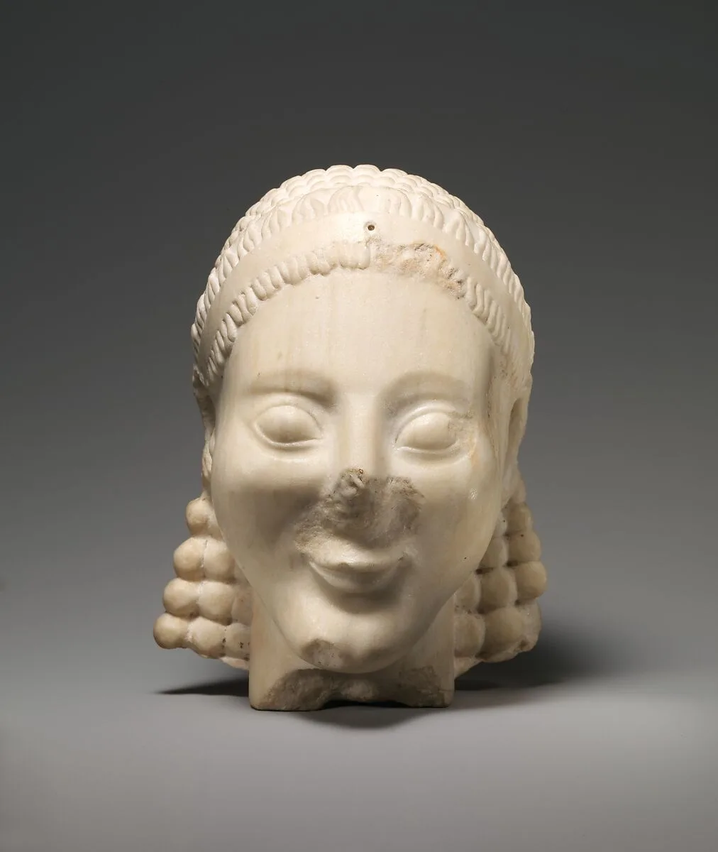 Marble head of a kouros (youth) — Unknown