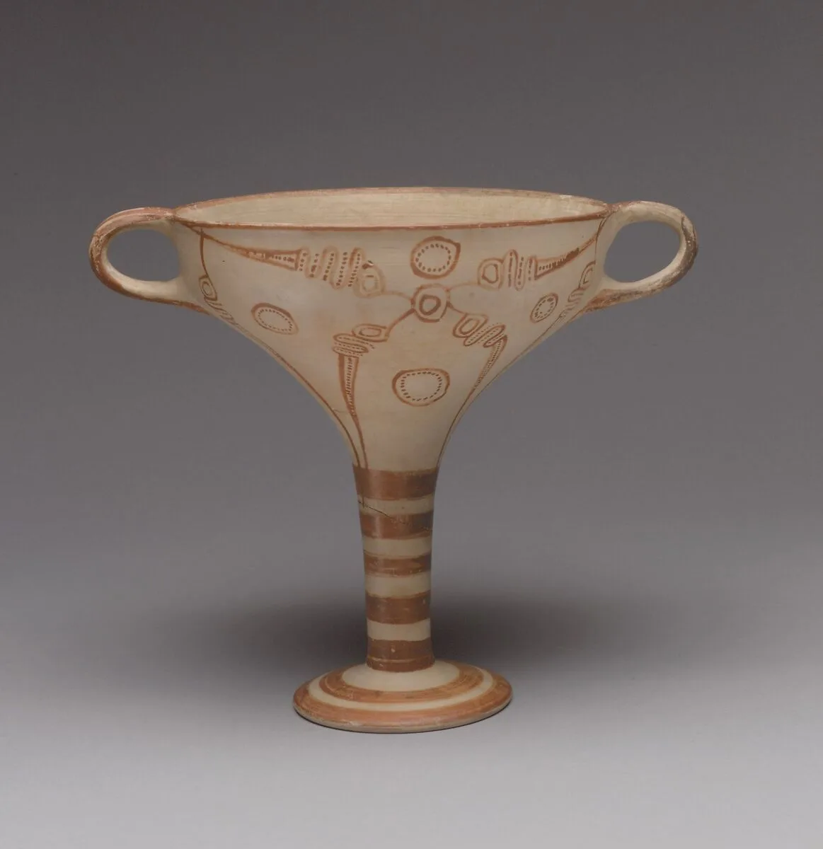 Terracotta stemmed cup with murex decoration — Unknown