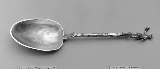 Figure-top spoon