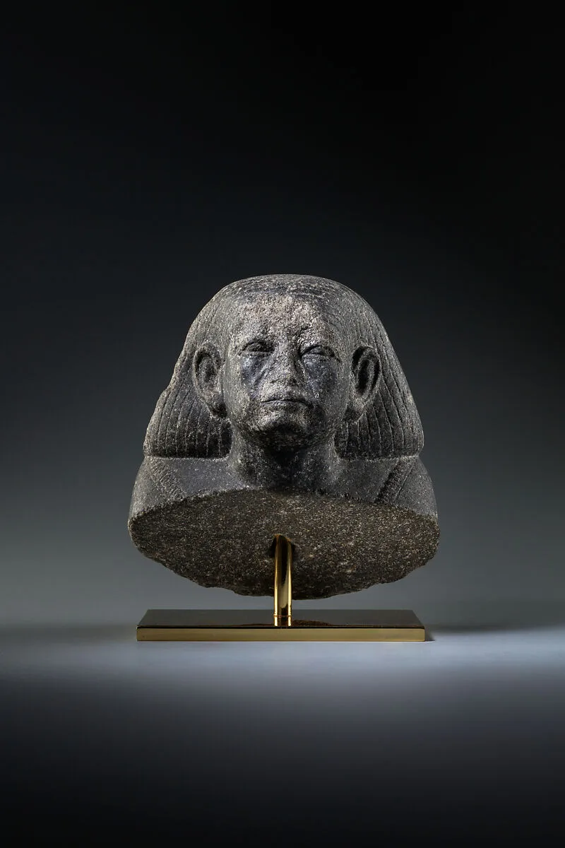 Head and shoulders of a male statue — Unknown