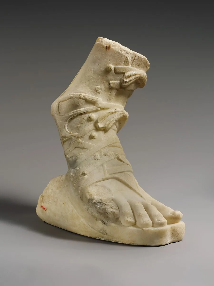 Marble right foot wearing a sandal — Unknown