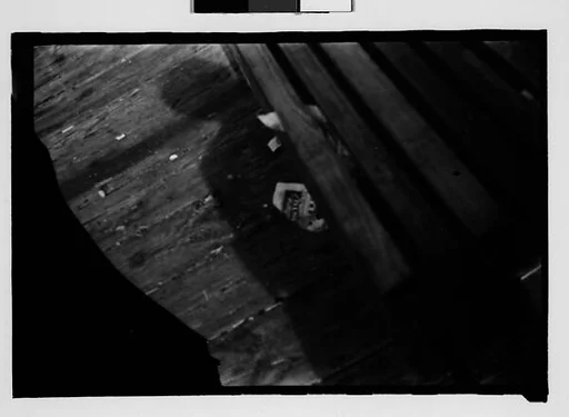 [Ten 35mm Film Frames on Uncut Roll: 8 Views of Sponge Diving Boats and Sponges Drying at Dock, and 2 Shadow Self-Portraits at Dock, Tarpon Springs, Florida]