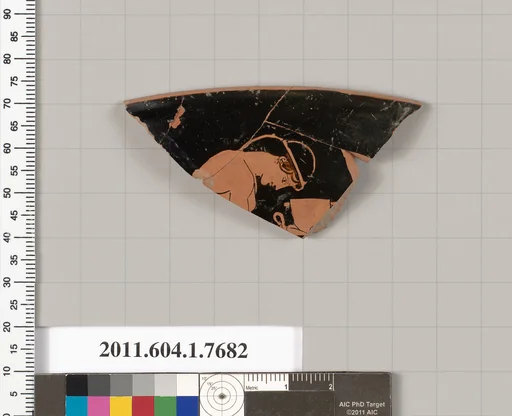 Terracotta rim fragment of a kylix (drinking cup)