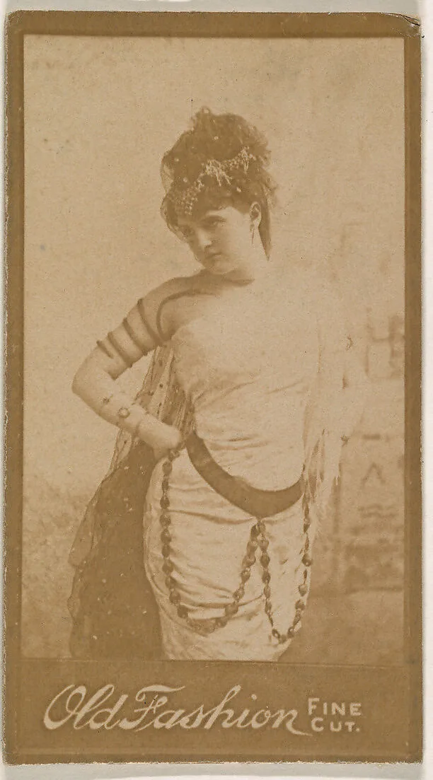 Actress wearing costume with spiral armband, from the Actresses series (N664) promoting Old Fashion Fine Cut Tobacco — Unknown