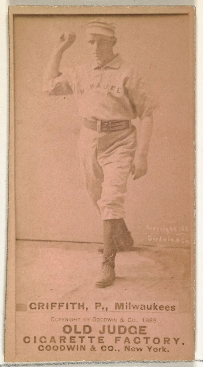 Clark Calvin "Old Fox" Griffith, Pitcher, Milwaukee, from the Old Judge series (N172) for Old Judge Cigarettes — Goodwin & Company