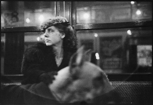 [Four 35mm Film Frames: Subway Passengers, New York City:  Woman with Flower-Brim Hat and Dog, Two Men in Conversation, Man in Cap]