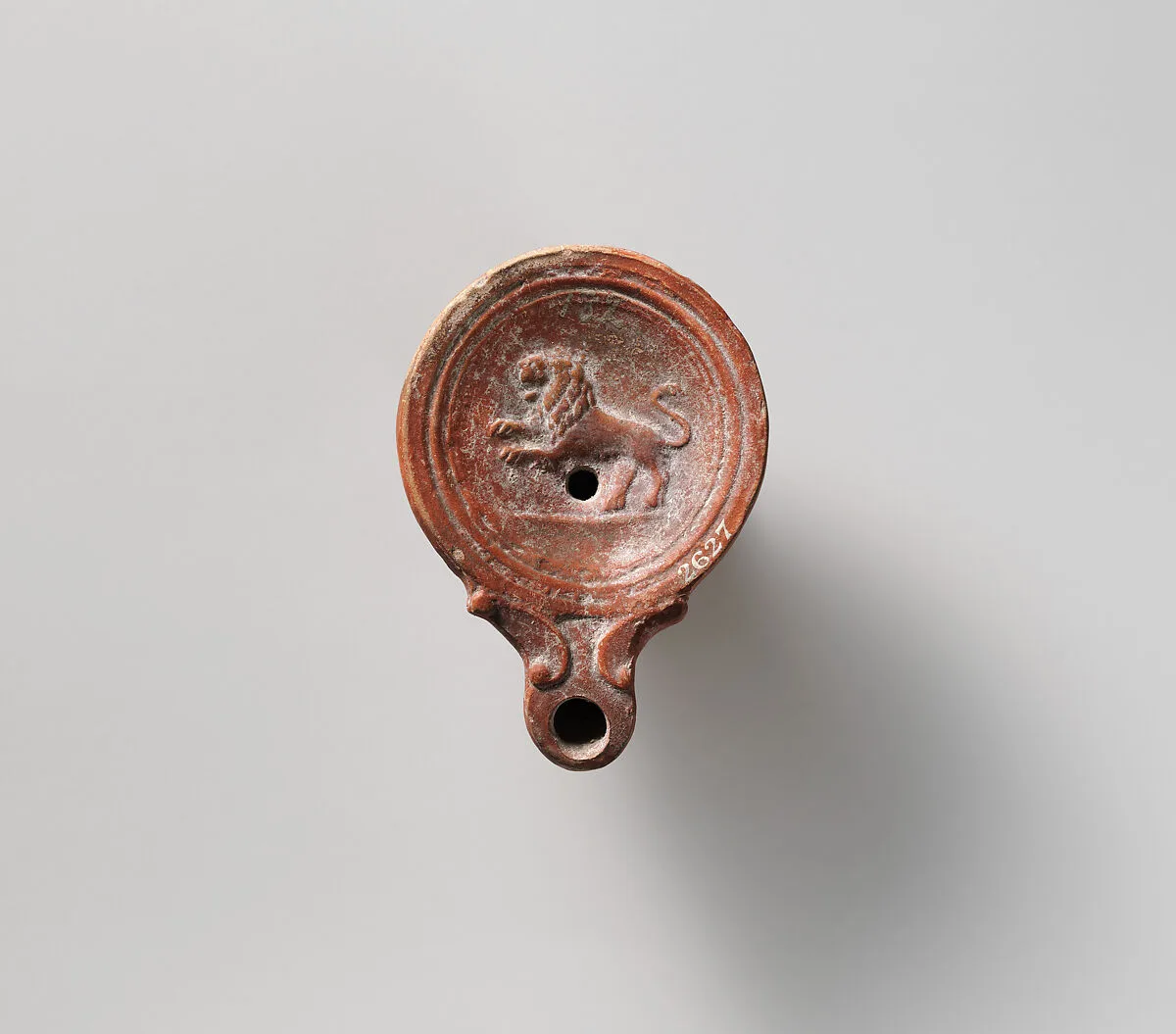 Terracotta oil lamp — Unknown